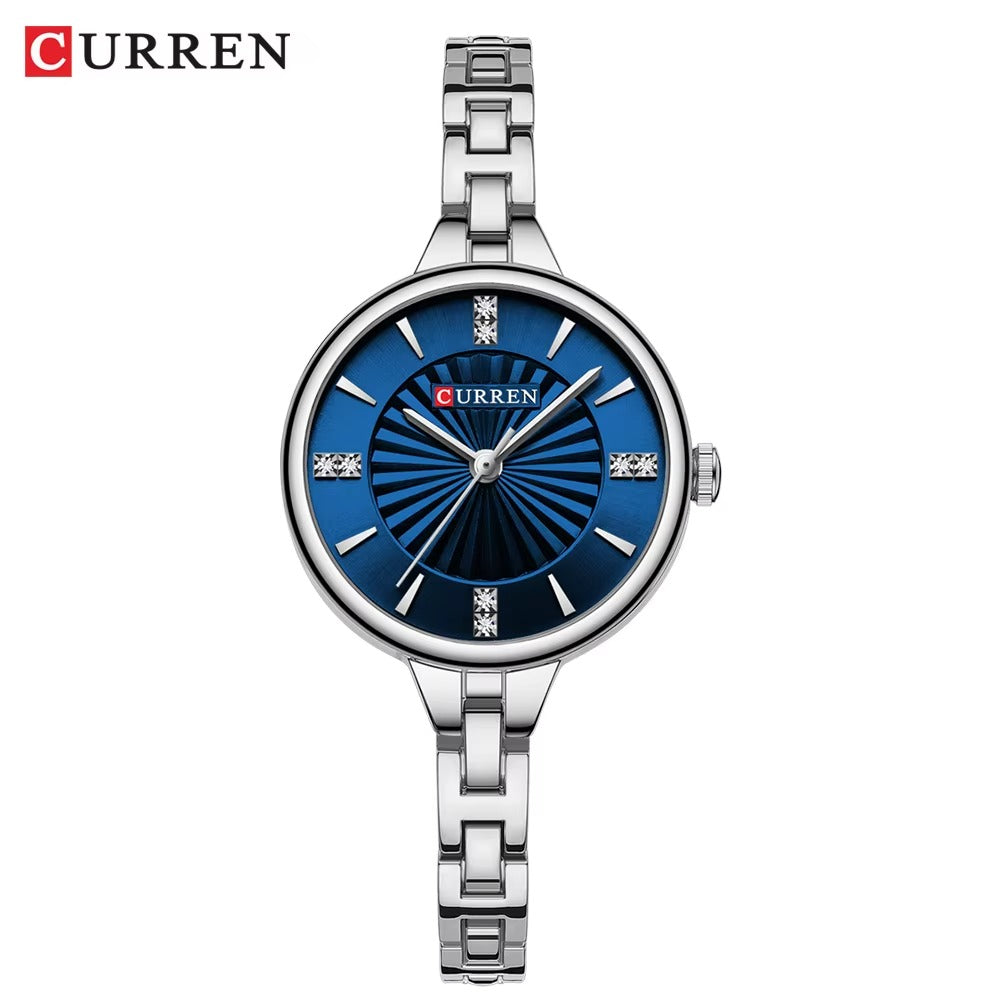Curren 9097 women’s luxury wristwatch with sky blue dial and silver stainless steel bracelet.