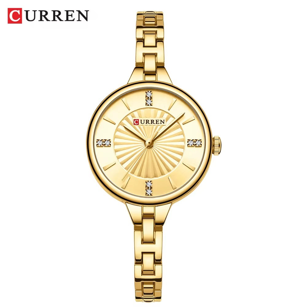 Curren 9097 women’s luxury wristwatch with gold dial and gold stainless steel bracelet.