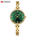 Curren 9097 women’s luxury wristwatch with green and gold stainless steel bracelet.