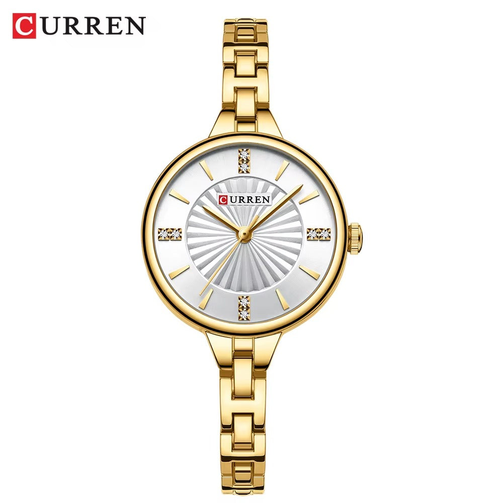 Curren 9097 women’s luxury wristwatch with silver dial and gold stainless steel bracelet.