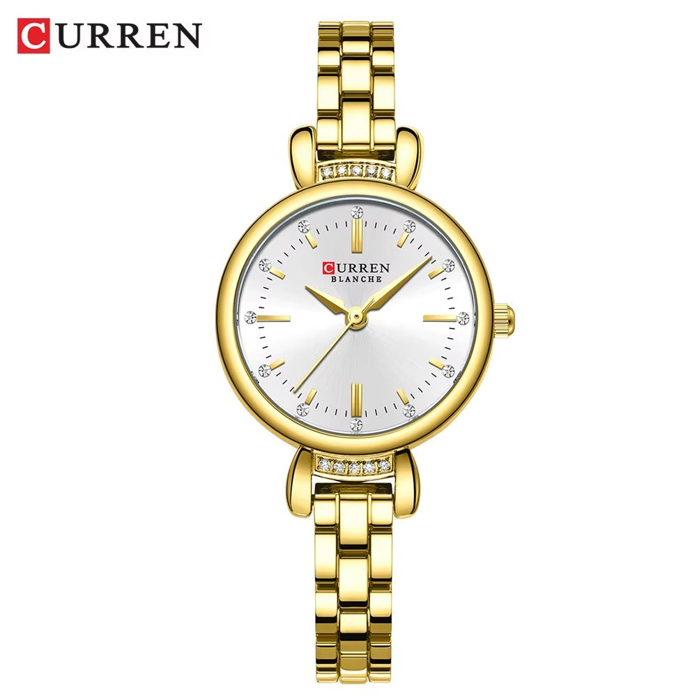 Curren Blanche women’s luxury wristwatch with white dial and gold stainless steel bracelet.