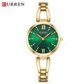 Silver women’s Curren Blanche wristwatch with green dial, gold hour markers, and stainless steel bracelet on white background.
