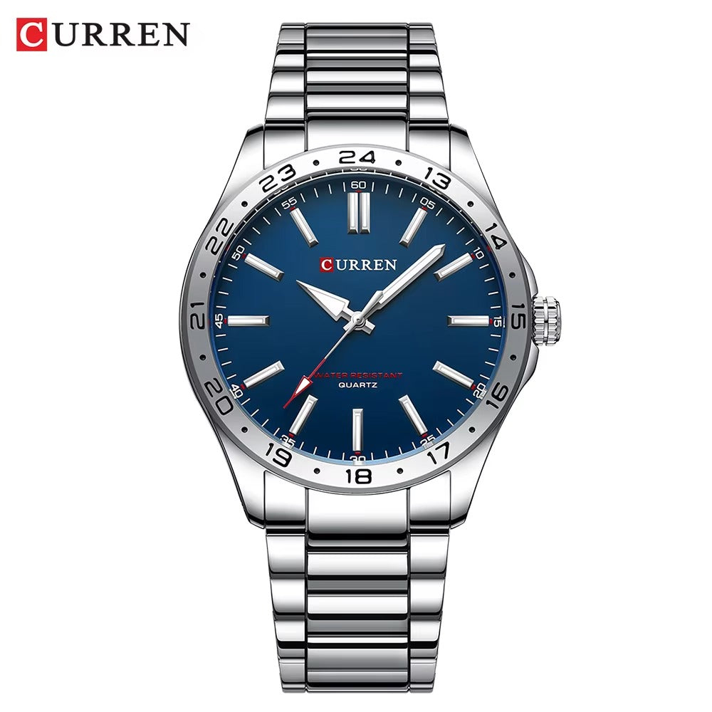 Curren men’s stainless steel wristwatch with blue dial, silver bracelet, and minimalist luxury design.