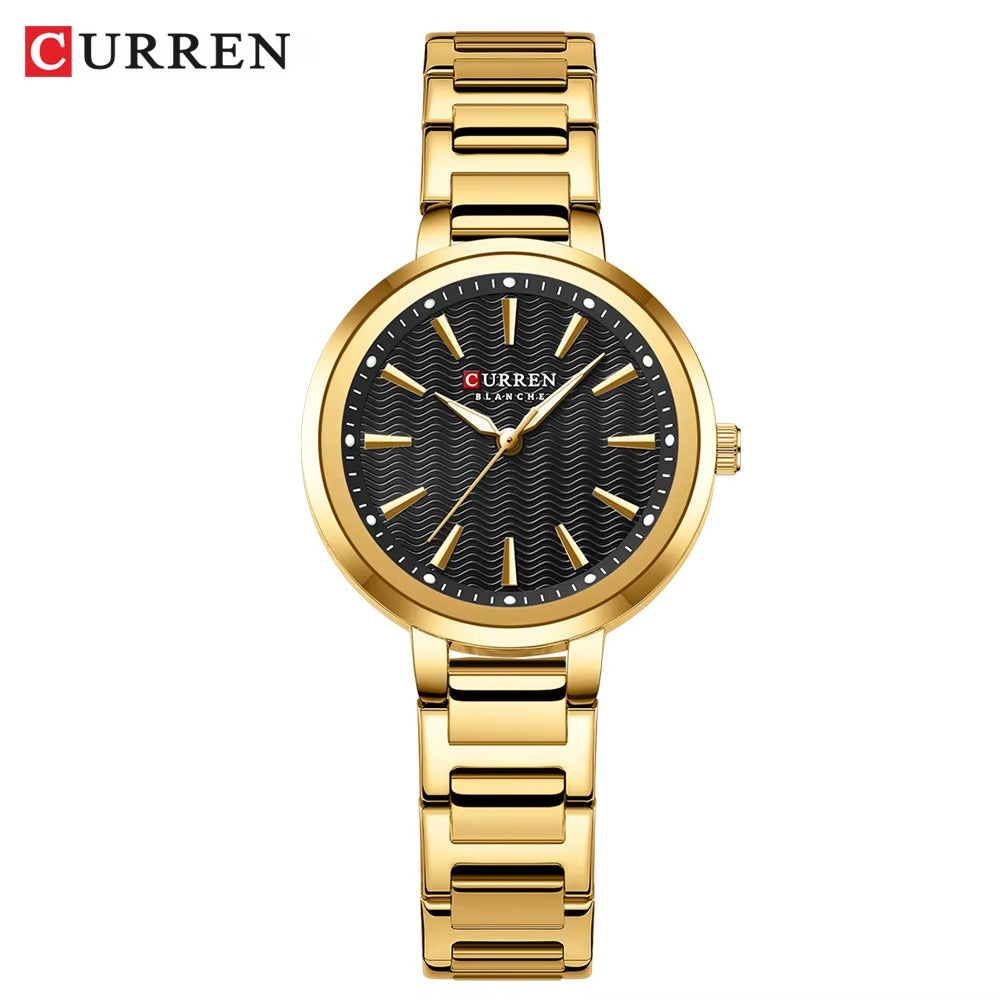 Gold wristwatch with black face on a white background, featuring the brand 'Curren'.