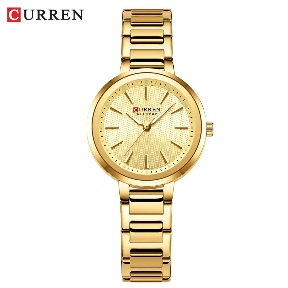 Gold wristwatch with Curren branding on a white background